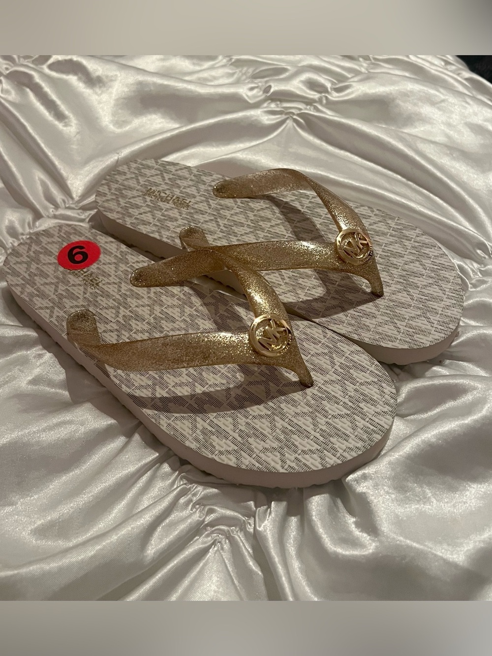 Michael Kors vanilla/gold glitter flip flops